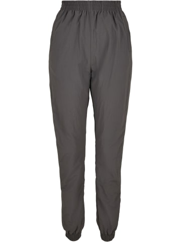Urban Classics Track Pant in darkshadow/electriclime