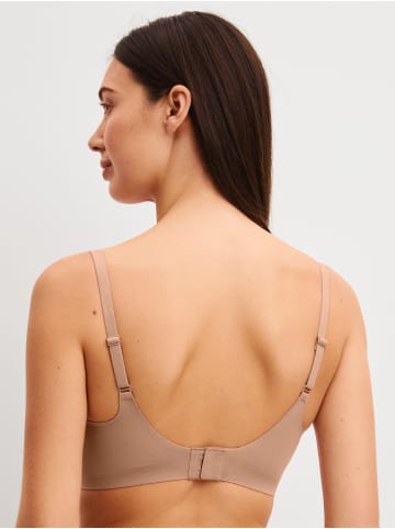 Calida Soft-BH in timeless taupe
