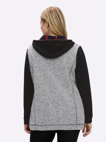 sheego Kapuzenfleecejacke in schwarz-ecru-meliert