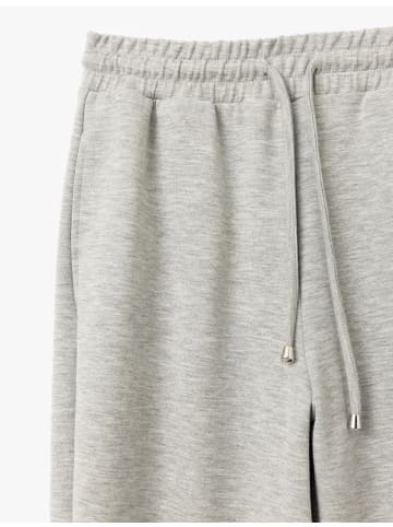 KOTON Sweat Bottoms in Grau Melange Gemustert