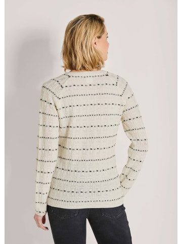 MADELEINE Eleganter Wollpullover mit V-Ausschnitt in wollweiß / schwarz