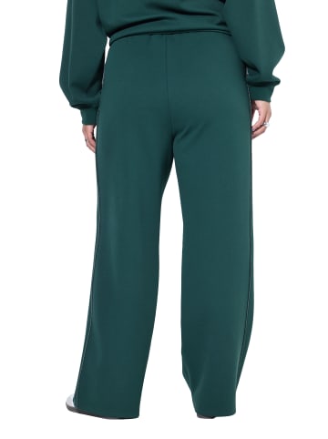 Studio Untold Hosen in dunkelgrün