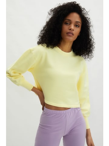 ADLYSH Sweatshirt Hideaway Sweater in Pastel Yellow