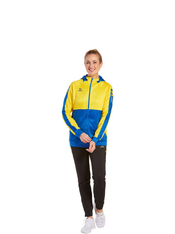 erima Damen Six Wings Trainingsjacke mit Kapuze in new royal/gelb