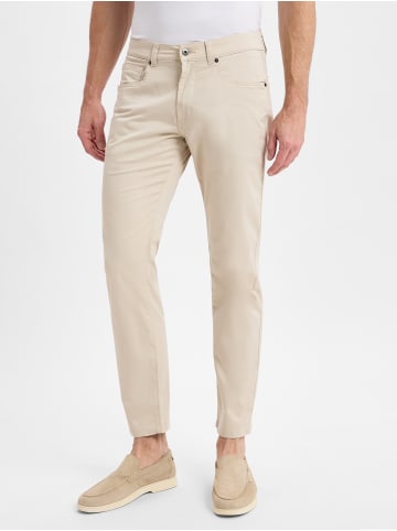 Andrew James Hose in sand