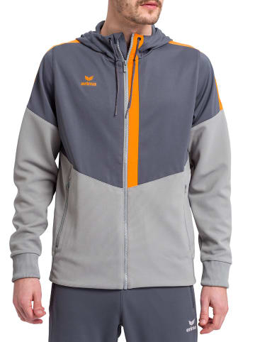 erima Squad Trainingsjacke mit Kapuze in slate grey/monument grey/new orange