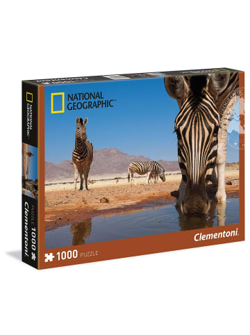 Puzzle Zebra trinkt an einem Wasserloch 1000 Teile in mehrfarbig