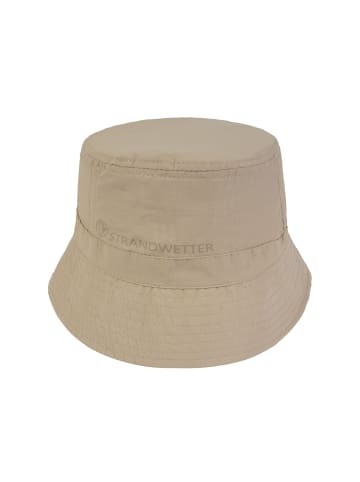 Buckethat "Kelly" in sand