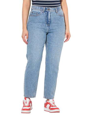 Jeans in mid blue denim