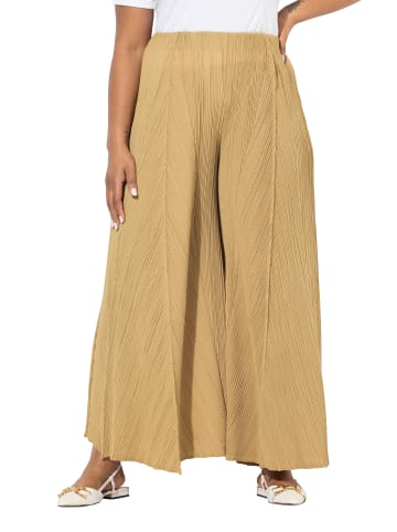 Schlupfhose in dunkles gold