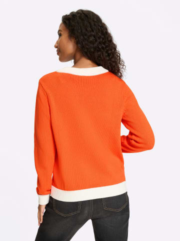 Strickjacke in orange-ecru