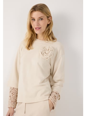 feminines Sweatshirt mit Spitzendetail und Blütenapplikation in powder cream