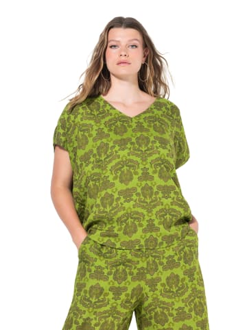 Bluse in erbse