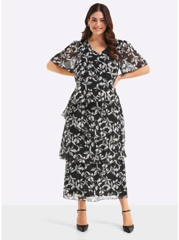 Abendkleid in schwarz-weiß-gemustert