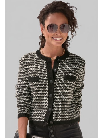 Strickjacke in schwarz-weiß kariert