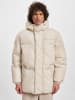TOMMY JEANS Puffer Jacket in newsprint