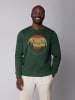 wat? Apparel Sweatshirt Sunset Berge & Tannen in Bottle Green