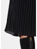 GOLDNER Schwingender Plisseerock in schwarz