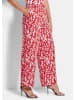 GOLDNER Druckhose mit floralem Muster in rot / weiß / gemustert