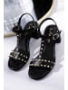 Aniston SHOES Riemchensandalette in schwarz-goldfarben