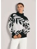 MADELEINE Moderner Winterpullover mit floralem Strickmuster in schwarz / wollweiß