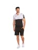 erima Six Wings Poloshirt in schwarz/weiss