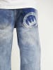 DADA Baggy Denim Loose Fit Jeans mit Coin Logo Print in Blau