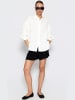 SASSYCLASSY Musselin Bluse mit Lochstickerei in Offwhite