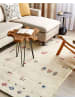 Beliani Geflochtener Teppich SULUCA in Beige/Rot/Blau - (W) 140 x (L) 200 cm