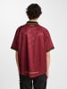 Hummel Polo Hmlloose Erwachsene in SYRAH