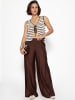 SASSYCLASSY Stricktop mit Schleifenverschluss in Offwhite