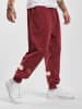 Sergio Tacchini Sergio Tacchini Herren Sergio Tacchini Orion Rib Velour Trainingshose in merlot