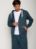 GreenBomb Jacke Bike Single in Blauer Stein