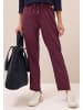 Cecil Hose in mulberry red