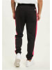 Ecko Unltd. Jogginghose in black/red/lime/white