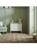 KADIMA DESIGN Naturfarbener, handgewebter Juteteppich mit floralem Muster
