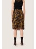 Soaked in Luxury Rock SLGunvy Feminine Form in Tortoise Print
