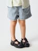 name it Shorts in Light Blue Denim