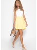 SASSYCLASSY Musselin Rock mit Godet-Falten in Gelb