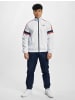 Sergio Tacchini Trainingsanzüge in navy/white/adrenaline rush