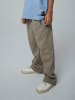 name it Sweathose NKMONSLO LOOSE SWE PANT BRU in roasted cashew