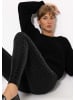 SASSYCLASSY Kunstleder Leggings mit Leo Print in Schwarz
