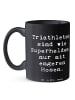 Mr. & Mrs. Panda Trinkbecher Spruch Triathlon Superheld mit Spruch in Schwarz