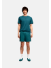 Puma Shorts 'ESS Tape Woven Shorts 5' in dunkelgrün