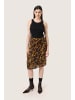Soaked in Luxury Rock SLGunvy Feminine Form in Tortoise Print