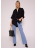 SASSYCLASSY Oversize Musselin Bluse in Schwarz