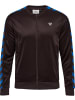 Hummel Trainingsjacke "Archive Regular Poly Zip Jacket" in Braun