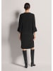 MADELEINE Etui-Kleid mit Trompetenärmeln in schwarz
