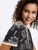 Heine Jerseykleid in schwarz-sand-bedruckt
