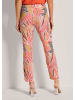 MADELEINE Farbige Schlupfhose mit grafischem Print in blutorange / multicolor
